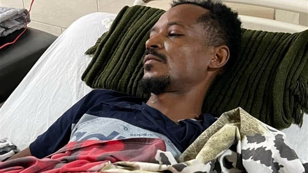 الصورة: لقطة من لقاء مسجل مع الشاب السوداني أحمد المدثر بالمستشفي الجامعي بأسيوط. الوطن نيوز ©